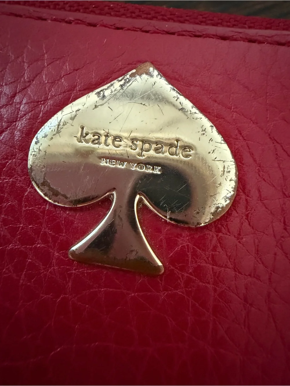 kate spade Red Pebbled Leather Zip Wallet with Bow Pull